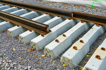 Laying new tram rails on new concrete sleepers with pads that reduces vibration and noise emission