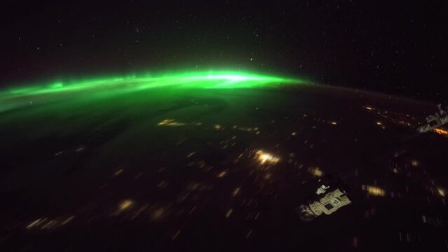 Northern Lights over planet Earth seen from space. View from International Space Station. Public Domain images from Nasa