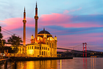 Fototapeta na wymiar Ortakoy Mosque and the Bosphorus of Istanbul, impressive sunset scenery of the capital of Turkey