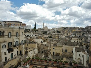 Aerial shot of the Matera cityscape on the rocky outcrop in the region of Basilicata