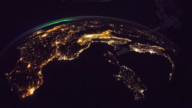 Cities illumination at night seen from space. Flying over Planet Earth. View from International Space Station. Public Domain images from Nasa	
