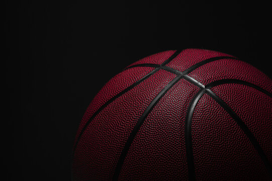 Closeup detail of basketball ball texture background. Horizontal sport theme poster, greeting cards, headers, website and app