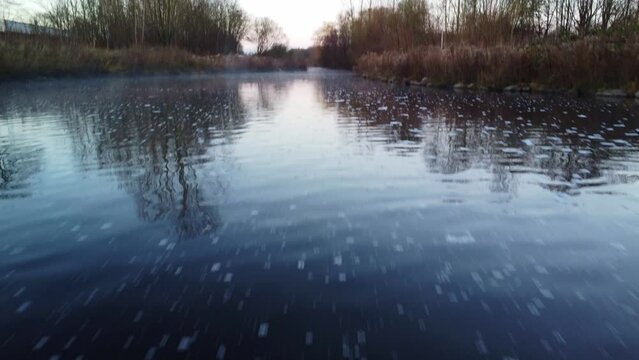 Drone fottage of a Small lake in a small town park