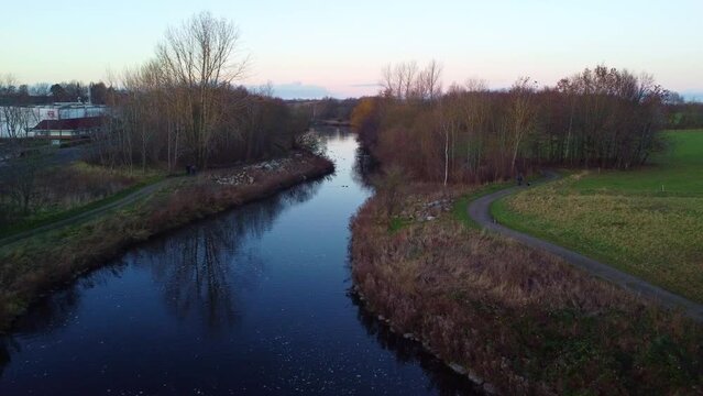 Drone fottage of a Small river in a small town park