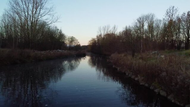 Drone fottage of a Small river in a small town park