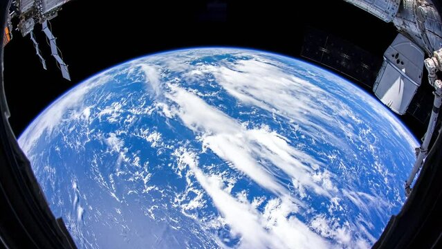 Beautiful clouds and atmosphere of Planet Earth from above. Flying over planet Earth. View from International Space Station. Public Domain images from Nasa	