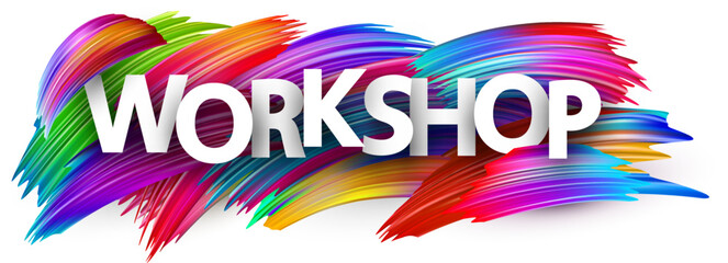 Workshop paper word sign with colorful spectrum paint brush strokes over white.
