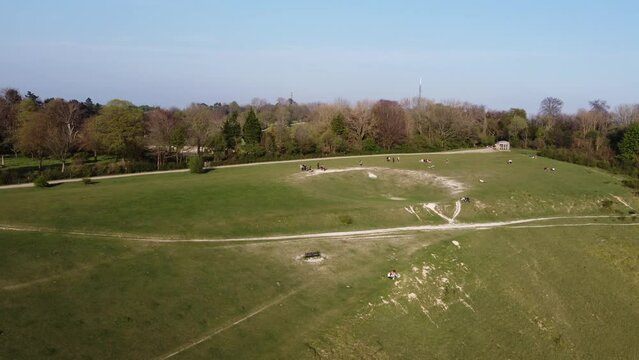 Aerial shot of grass field at Reigate Hill and Gatton Park in Reigate, Surrey, England
