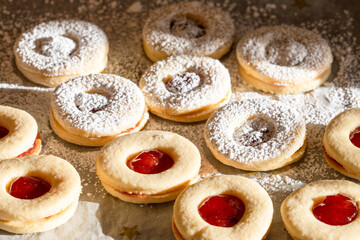 Close-up of home-baked cookies German-style Spitzbuben with marmalade