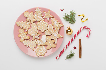 Cute homemade Christmas cookies with decor on color background,top view