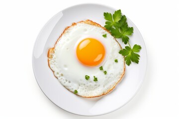 Delicious fried egg served on a pristine white plate, isolated on a clean white background