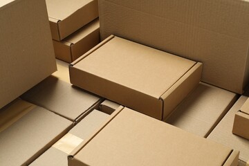 Many cardboard boxes as background, closeup. Packaging goods - obrazy, fototapety, plakaty