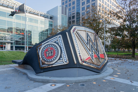A sculpture of a championship belt in front of the offices of WWE on Washington Boulevard in Stamford, Connecticut, on November 7, 2023. WWE is an American professional wrestling promotion.
