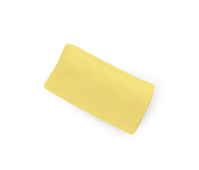 Yellow chewy candy with liquorice isolated on white, top view