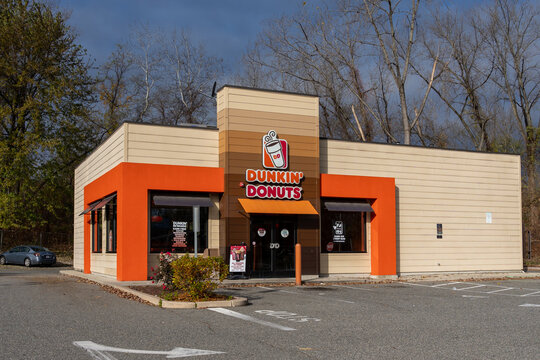 A Dunkin' Donuts  restaurant in West Springfield, MA, USA, on November 12, 2023. Dunkin' is an American multinational coffee and doughnut company. 