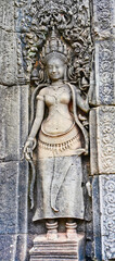 A Stone bas reliefs depicting a Goddess, carved in stone at Bayon Temple at Siem Reap, Cambodia,...