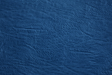 Dark blue leather texture background with seamless pattern and high resolution.