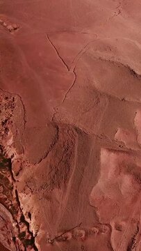Aerial top view of stone desert in Atlas Mountains, Morocco, Africa. Vertical video