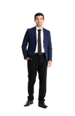 Young businessman on white background