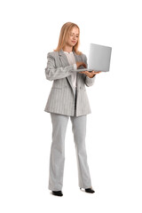 Young beautiful businesswoman working with laptop on white background