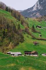 Scenic mountain village surrounded by the mountain, Canton Schwyz, Switzerland, Europe.