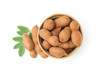 Bowl of tasty tamarinds and leaf on white background