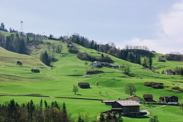 Fototapeta na wymiar Scenic mountain village surrounded by the mountain, Canton Schwyz, Switzerland, Europe.