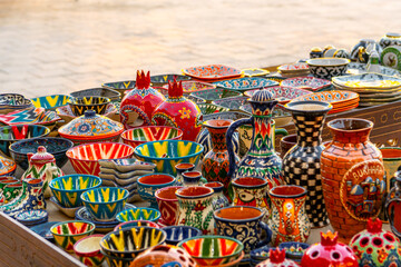 Fototapeta premium Plates and pots on a street market in the city of Bukhara, Uzbekistan
