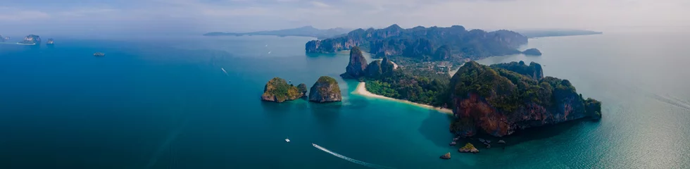 Fototapete Railay Strand, Krabi, Thailand Railay Beach Krabi Thailand, the tropical beach of Railay Krabi, view from a drone of idyllic Railay Beach in Thailand at sunset. Panorama banner of beach