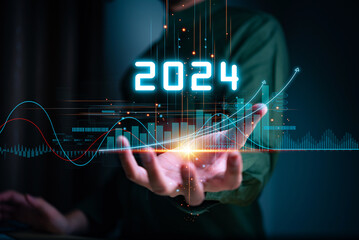 Businessman forecste analyze graph corporate future growth year 2024. New Goals with Plans and Visions for Next Year 2024, Opportunity, challenge and business strategy.