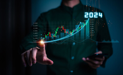 Businessman forecste analyze graph corporate future growth year 2024. New Goals with Plans and...