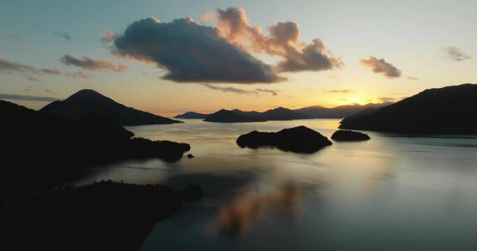 Aerial view of stunning peninsula landscape in Elaine Bay with still, calm water in the remote wilderness of Pelorus Sound Te Hoiere of Marlborough Sounds, South Island of New Zealand Aotearoa