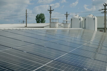 Solar panel array on on a warehouse roof 