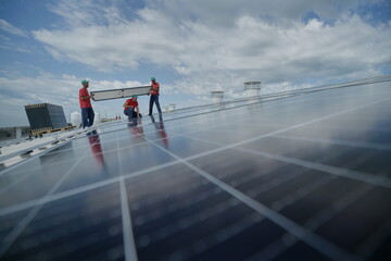 Solar panel array on on a warehouse roof 