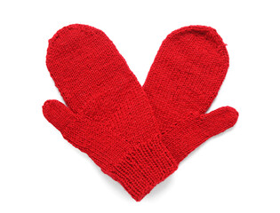 Pair of knitted warm mittens on white background