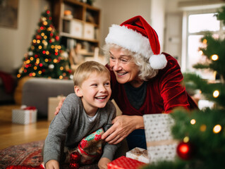 Obraz na płótnie Canvas Grandparents and grandchildren celebrate Christmas in the living room