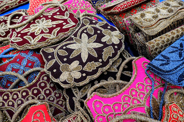 Colorful handcrafted cotton hand bags for sale in the local market., Pune, India.