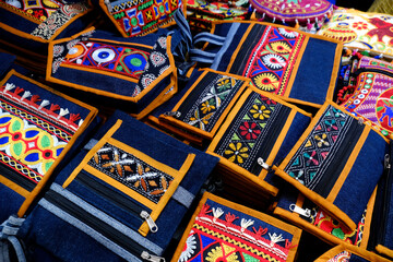 Colorful handcrafted cotton hand bags for sale in the local market., Pune, India.