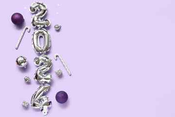 Fototapeta premium Composition with figure 2024 made of foil balloons and Christmas decorations on lilac background