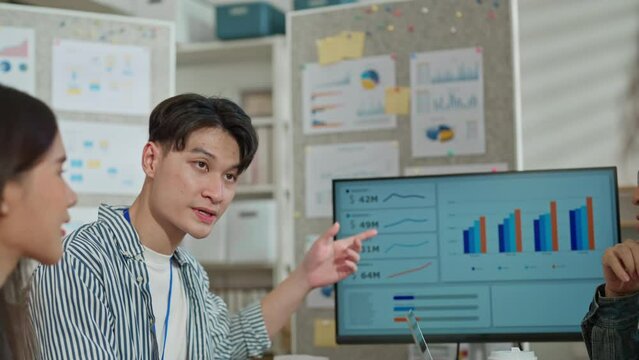 new startup project business plan datachart presentation creative agency team present number barchart and infographic to their co worker for new project strategy pilot data analysis in meeting room 