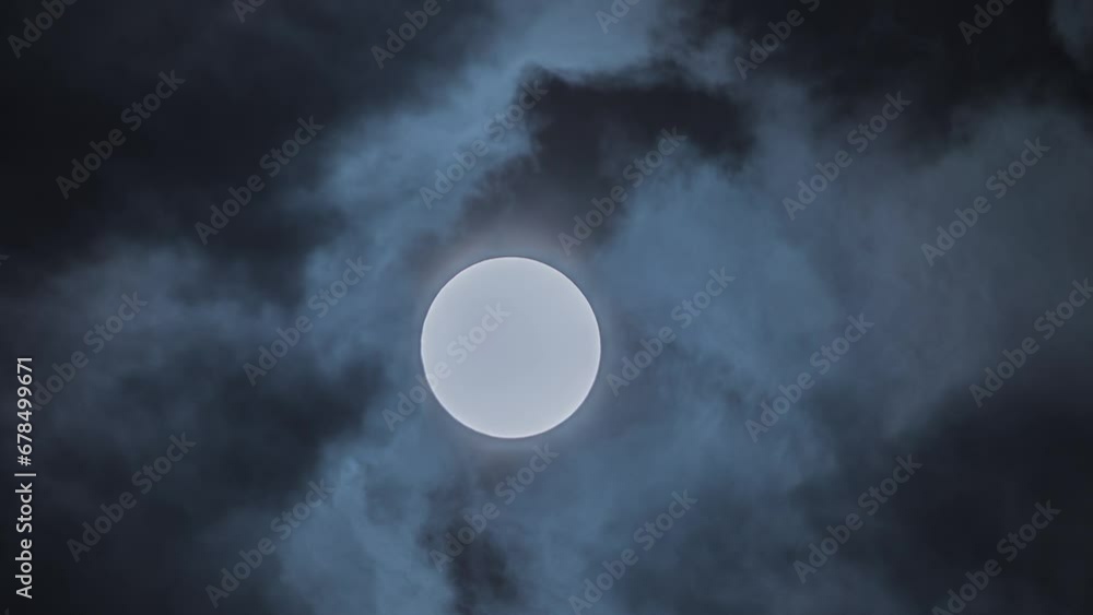 Sticker mesmerizing time lapse of clouds and full moon. perfect for mystical and atmospheric content