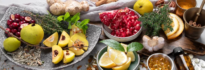 Keuken spatwand met foto Fruits, vegetables and herbs for healthy immune system. © bit24