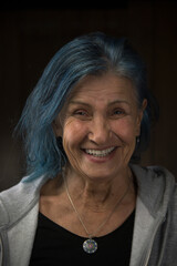 Radiant Senior Woman portrait with Blue Dyed Hair - 678510205