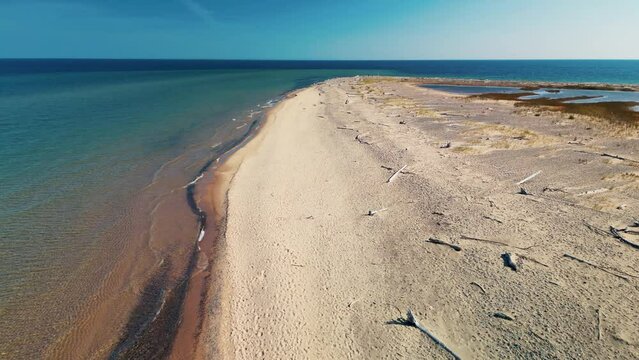 Aerial view down beach coastline of whitefish point, lake superior, michigan