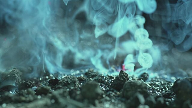 Smoke Floats Up from the Burning Embers