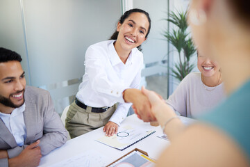 Business people, handshake and finance meeting in office for promotion, onboarding or welcome to company. Women, shaking hands or happy for congratulations, hiring or thank you with teamwork in group