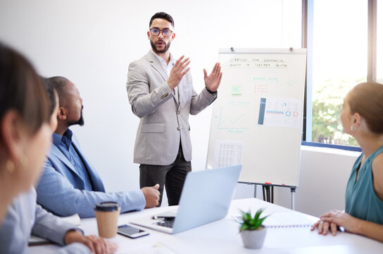 Presentation whiteboard, business people meeting and man speech, report or teaching group, team or workshop. Strategy, management and corporate speaker explain project to listening professional staff