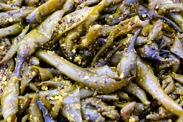 Sweet and sour homemade pickle (aam ka aachar) prepared in India.