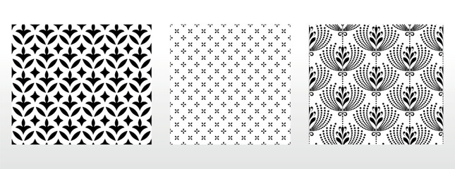 Geometric floral set of seamless patterns. White and black vector backgrounds. Damask graphic ornaments.