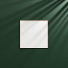 Hanging frame mockup on dark green wall